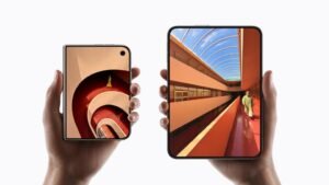 Two hands holding Apple iPhone Duo, shown folded and unfolded